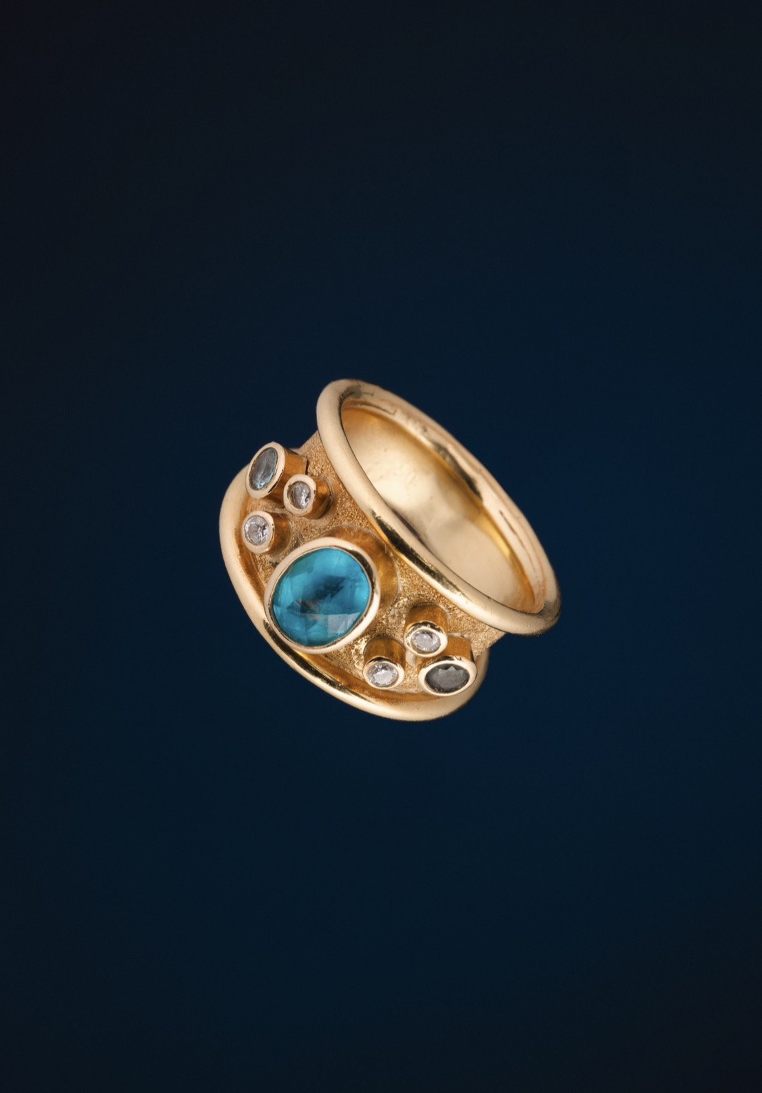 Blue Cabochon Ring — Three-quarter view