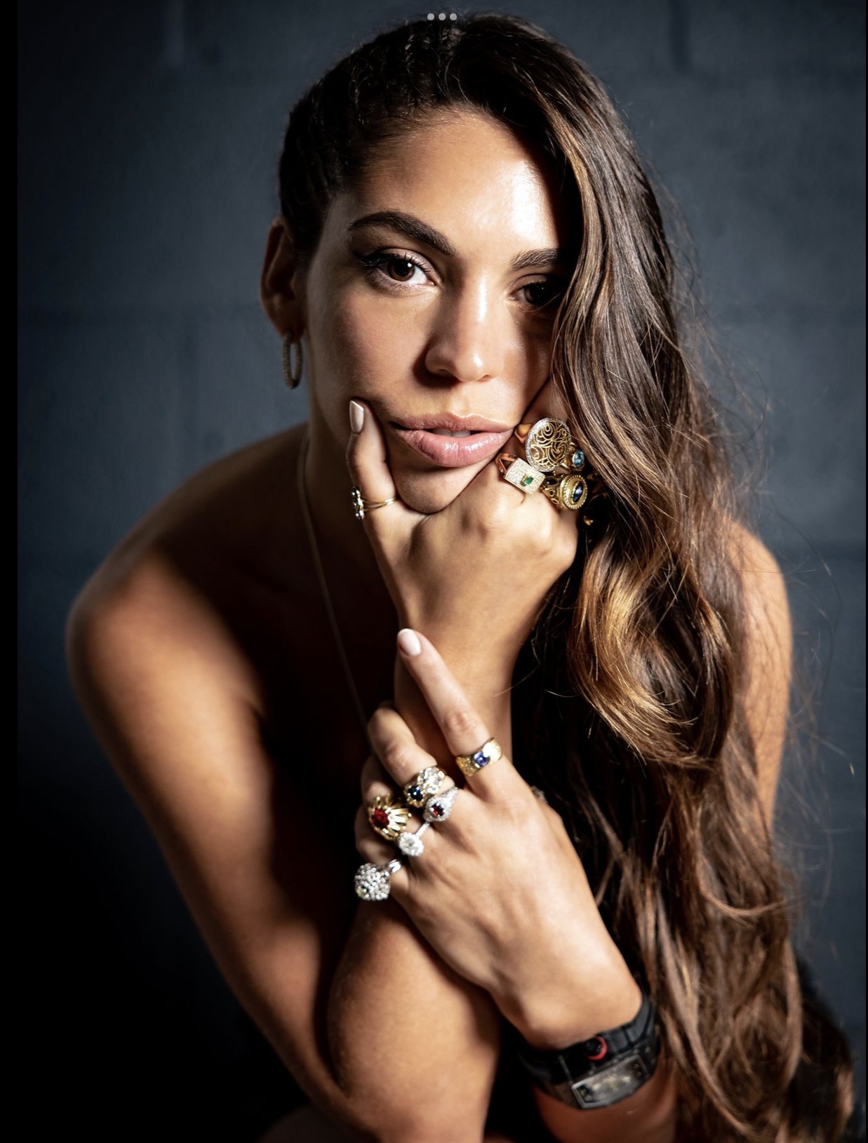 Editorial portrait wearing NIBIRU sculptural rings